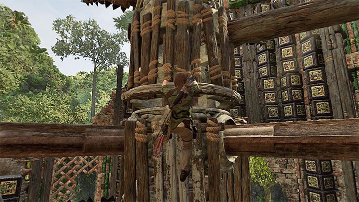 Tak samo jak wcześniej zaczekaj na dobry moment na doskoczenie do jednej z drabinek przymocowanych do centralnego mechanizmu - Jak zaliczyć Próbę Orła w Shadow of the Tomb Raider? - Shadow of the Tomb Raider - poradnik do gry