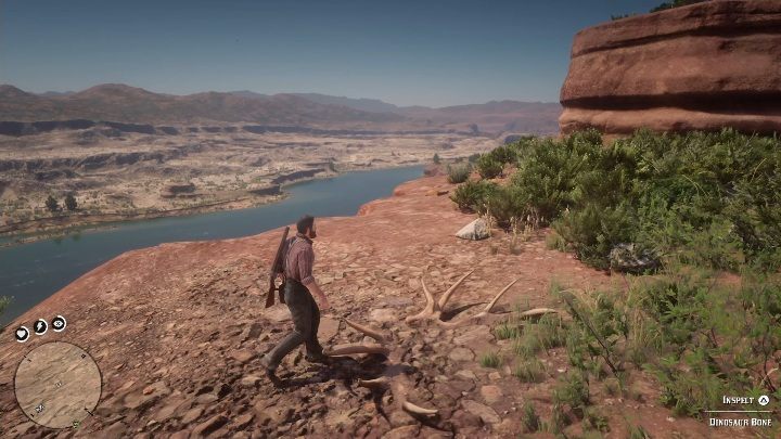 Kości te znajdują się na zboczu góry, nad urwiskiem - Red Dead Redemption 2: Kości dinozaurów - Sekrety i znajdźki - Red Dead Redemption 2 - poradnik do gry