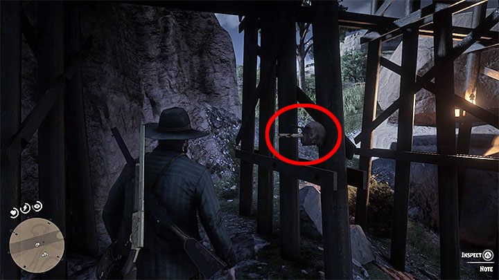 Odszukaj głowę przybitą do jednej z podpór mostu (tak jak wcześniej pomóż sobie w razie potrzeby Orlim wzrokiem) i zdobądź nowy fragment zagadki (Killer Clue Piece) - Red Dead Redemption 2: Amerykański sen - opis przejścia, mapa, porady - Red Dead Redemption 2 - poradnik do gry