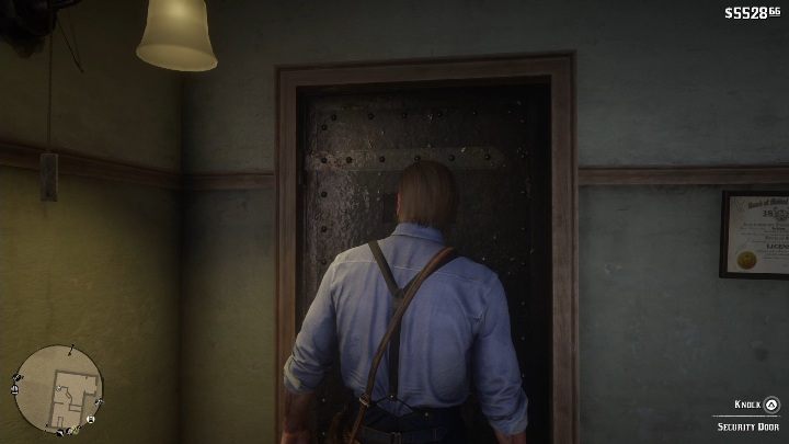 Wejdz do sklepu i zapukaj do drzwi bezpieczeństwa - Red Dead Redemption 2: Napady na sklepy - jak obrabować? Lista, lokacje, mapy - Red Dead Redemption 2 - poradnik do gry