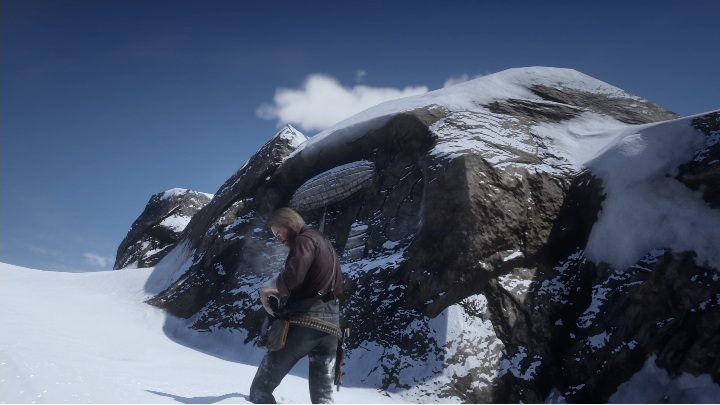 Obiekt ten znajduje się na samym szczycie, wystarczy jednak, że pojedziesz tam konno i spiszesz lokację petroglifu - Red Dead Redemption 2: Petroglify, rysunki naskalne - gdzie znaleźć? Lista - Red Dead Redemption 2 - poradnik do gry