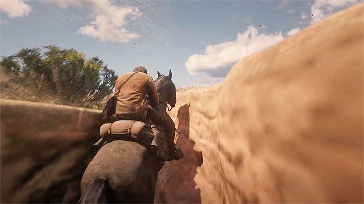 Po dotarciu do pokazanej na obrazku 1 końcowej części wąwozu zacznij galopować i wjedź koniem na skały - Red Dead Redemption 2: Meksyk - jak się przedostać? - Red Dead Redemption 2 - poradnik do gry