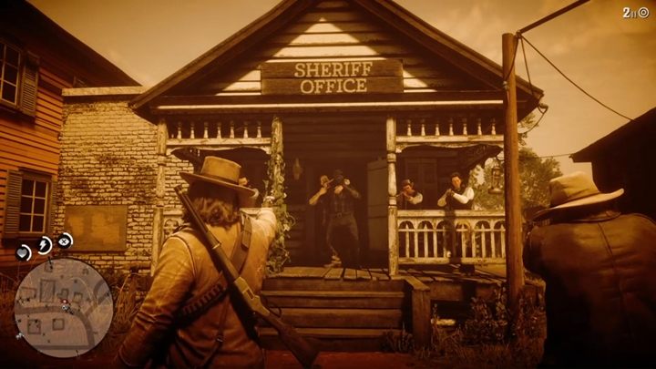 Mężczyznę odnajdziecie u szeryfa, który wziął go za zakładnika - Red Dead Redemption 2: Krótki spacer w ładnym miasteczku - Solucja - Red Dead Redemption 2 - poradnik do gry