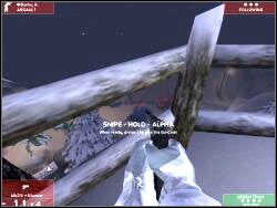 Idź cały czas wyznaczoną przez komputer ścieżką (będzie spokojnie) aż dojdziesz do punktu snajperskiego (widocznego na screenie) - Zadanie 3 - OPIS PRZEJŚCIA - Tom Clancys Rainbow Six 3: Raven Shield - poradnik do gry