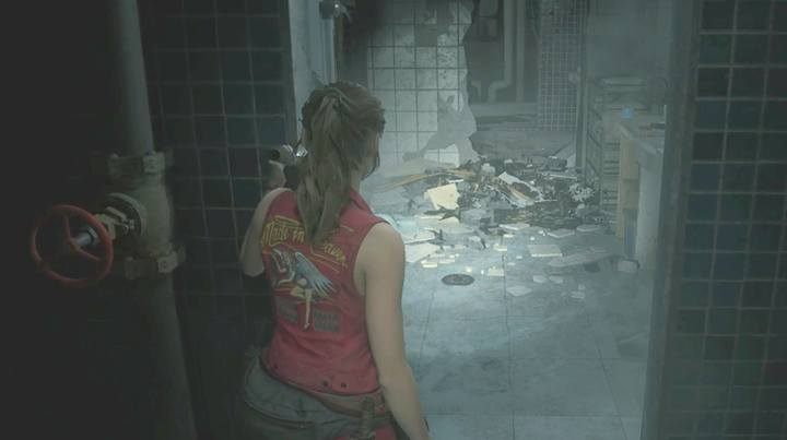 Udaj się teraz na klatkę schodową w północno-zachodniej części budynku - Zbierz 3 medaliony | Posterunek policji w Resident Evil 2 - Resident Evil 2 - poradnik do gry