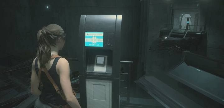 Skorzystaj z terminala, by wysunąć most do kolejnego obszaru - Gniazdo. Jak zdobyć III poziom uprawnień w ogrodzie? | Resident Evil 2 - Resident Evil 2 - poradnik do gry