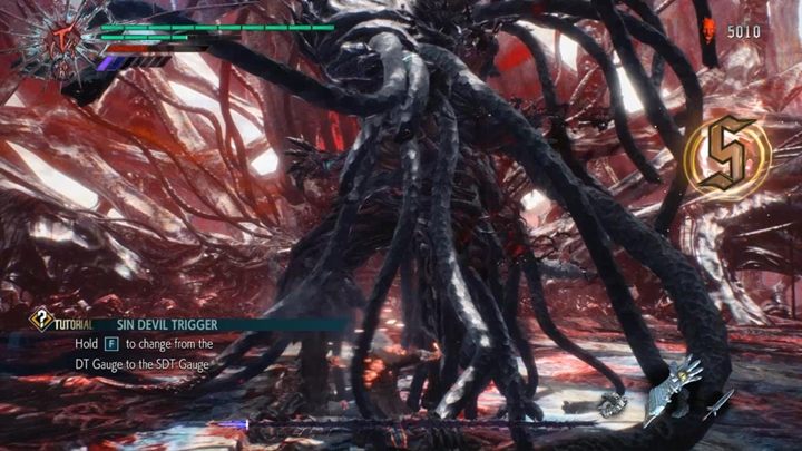 Kręć się dookoła wroga, używaj psotnika, a bardzo szybko zakończysz walkę - Urizen (Misja 12) - Boss w Devil May Cry 5 - Devil May Cry 5 - poradnik do gry