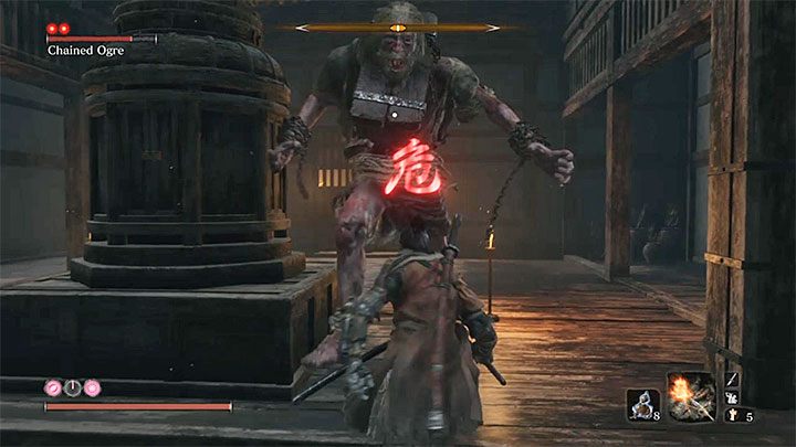 Ogr, z którym walczysz, dysponuje identycznymi atakami do bossa spotkanego w Podzamczu Ashiny - Skuty ogr #2 (Zamek w Ashinie) | Boss w Sekiro Shadows Die Twice - Sekiro Shadows Die Twice - poradnik do gry