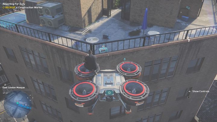 Część reflektora skutera znajduje się we wnęce między frontem, a właściwą konstrukcją budynku - Watch Dogs Legion: Relikty - mapa Tower Hamlets, lokacje - Watch Dogs Legion - poradnik do gry
