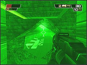 Wysadź cegły w powietrze i w nowym korytarzu rozwal deski leżące na podłożu, z lewej - Main Gate | Sopots Citadel | Red Faction II - Red Faction II - poradnik do gry