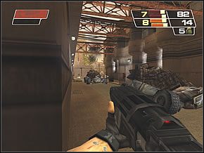 Przejdź ulicą dalej, uważając na wojaków czekających na dziedzińcu przy przyczepach i biegających po kładkach przy betonowym murze - Ammo Dump | Sopots Citadel | Red Faction II - Red Faction II - poradnik do gry