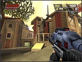 Podejdź do śmietnika stojącego przy ścianie, za pomnikiem - High Rent District | Hanging in the Hood | Red Faction II - Red Faction II - poradnik do gry