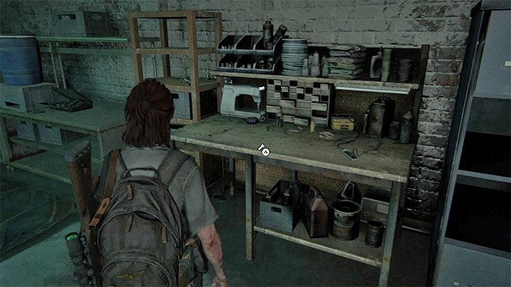 Po wejściu do środka wskocz do dziury w ścianie, a znajdziesz się w piwnicy ze stołem warsztatowym - The Last of Us 2: Hillcrest sekrety, znajdźki - The Last of Us 2 - poradnik do gry