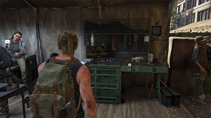 Stół warsztatowy jest wewnątrz jednego z namiotów - The Last of Us 2: Baza / The Forward Base sekrety, znajdźki - The Last of Us 2 - poradnik do gry