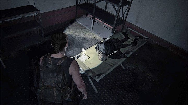 Znajdźka leży na metalowym łóżku w jednej z pierwszych kajut promu - The Last of Us 2: Wybrzeże / The Coast sekrety, znajdźki - The Last of Us 2 - poradnik do gry