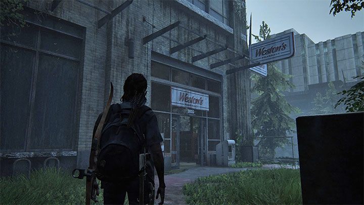Zainteresuj się budynkiem apteki Westons Pharmacy na lewo od zbiornika wodnego - The Last of Us 2: Seattle, dzień 2 Ellie - sejfy, kody - The Last of Us 2 - poradnik do gry