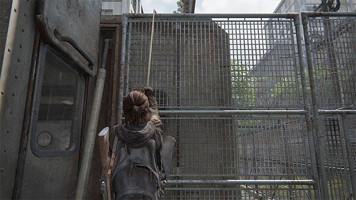 Musisz użyć wiszącego kabla do wspięcia się na dach mobilnego centrum dowodzenia - The Last of Us 2: Brama / The Gate sekrety, znajdźki - The Last of Us 2 - poradnik do gry