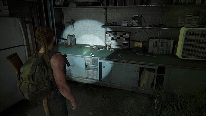 Warsztat jest w słabiej oświetlonym miejscu w hangarze - The Last of Us 2: Pieszo / On Foot sekrety, znajdźki - The Last of Us 2 - poradnik do gry