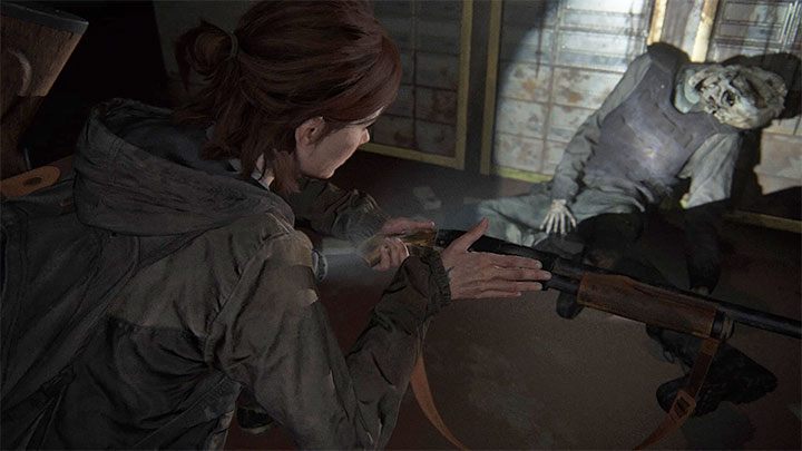 Wewnątrz skarbca na odkrycie czeka kilka unikalnych skarbów, przy czym strzelbę Pump Shotgun znajdziecie przy zwłokach jednego z mężczyzn, którzy próbowali obrabować bank - The Last of Us 2: Jak zdobyć strzelbę? - The Last of Us 2 - poradnik do gry
