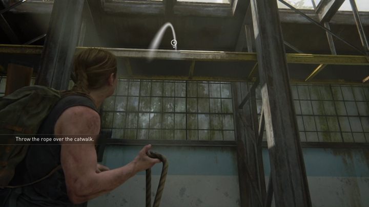 Podnieś teraz linę i rzuć nią tak, jak wskazuje powyższa ilustracja - The Last of Us 2: Pieszo - solucja, opis przejścia - The Last of Us 2 - poradnik do gry