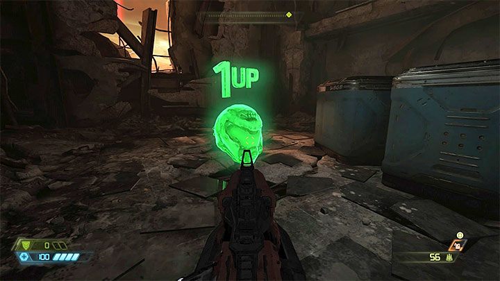 Dotknij lewitującego zielonego hełmu 1UP, by dodać 1 extra życie do puli - Doom Eternal: Dodatkowe życia - zastosowanie, czym są, kiedy użyć? - Doom Eternal - poradnik do gry