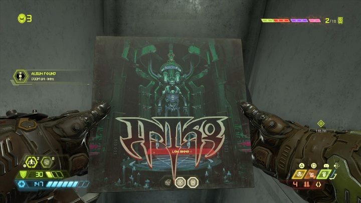 Aby dostać się do albumu musisz przejść przez szyb wentylacyjny, a następnie przeskoczyć do kolejnego szybu wykorzystując wiszące rury - Doom Eternal: Jądro Marsa | Mapa sekretów, znajdźki - Doom Eternal - poradnik do gry