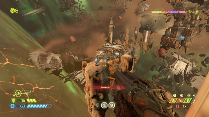 Aby dostać się do baterii strażniczej musisz przeskoczyć po lewitujących skałach - Doom Eternal: Jądro Marsa | Mapa sekretów, znajdźki - Doom Eternal - poradnik do gry