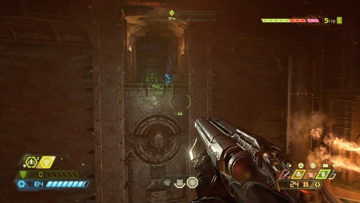 Aby dostać się do mapy musisz wskoczyć na sam szczyt płonącej pułapki, a na koniec przeskoczyć na bezpieczną, skalną półkę - Doom Eternal: Nekravol 2 | Mapa sekretów, znajdźki - Doom Eternal - poradnik do gry