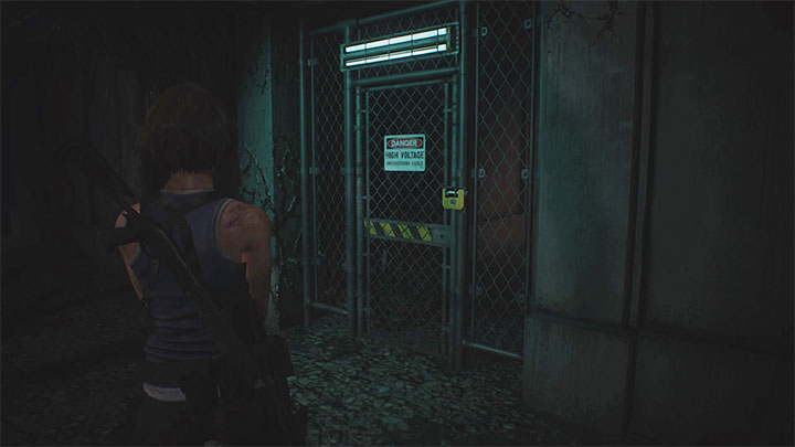 Z wytrychem trzeba dotrzeć do pokazanej na obrazku bramki, która prowadzi do obszaru z czterema wyłącznikami - Resident Evil 3: Zagadka z przywróceniem prądu w podstacji - Resident Evil 3 - poradnik do gry