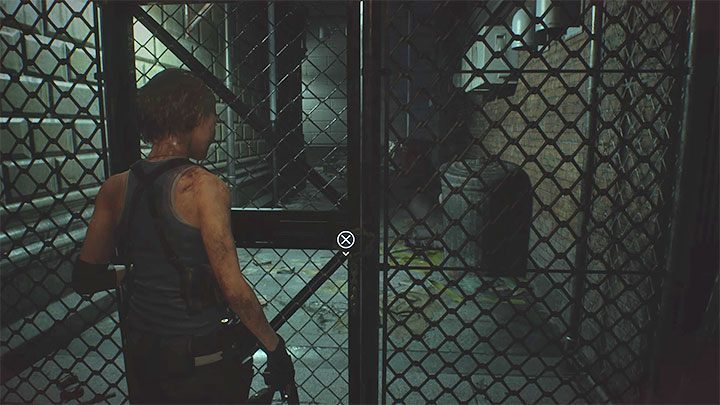 Przykładowe niedostępne przejście pokazuje dołączony obrazek - jest to metalowa bramka obwiązana łańcuchem - Resident Evil 3: Łańcuch - jak przeciąć? - Resident Evil 3 - poradnik do gry