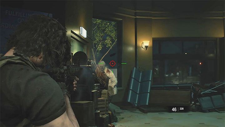 Niektóre zombiaki będą próbowały przebić się do pomieszczenia z ranną Jill - Resident Evil 3: Szpital, Carlos solucja, opis przejścia - Resident Evil 3 - poradnik do gry