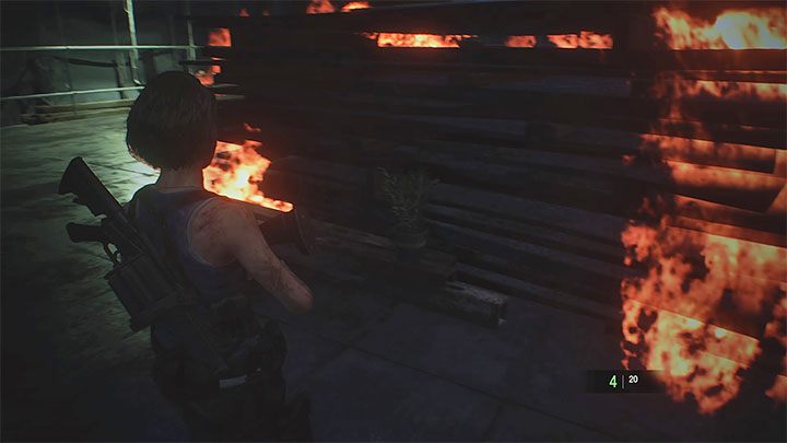 Nemesis używa w tym pojedynku miotacza ognia - Resident Evil 3: Miejsce rozbiórki solucja, opis przejścia - Resident Evil 3 - poradnik do gry