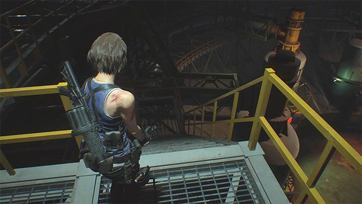 Trzeci obowiązkowy pojedynek z Nemesisem rozpocznie się niedługo po wyjściu z pomieszczenia Workers Break Room i przy próbie skorzystania z pokazanych na obrazku schodów - Resident Evil 3: Finał, Nemesis solucja, opis przejścia - Resident Evil 3 - poradnik do gry