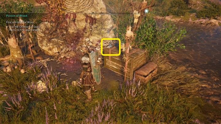Druga i ostatnia wskazówka leży na drewnianej skrzyni, w miejscu widocznym na powyższym screenie - AC Valhalla Gniew Druidów: Eliksir krwi/Potion of Blood - solucja - Assassins Creed Valhalla - poradnik do gry