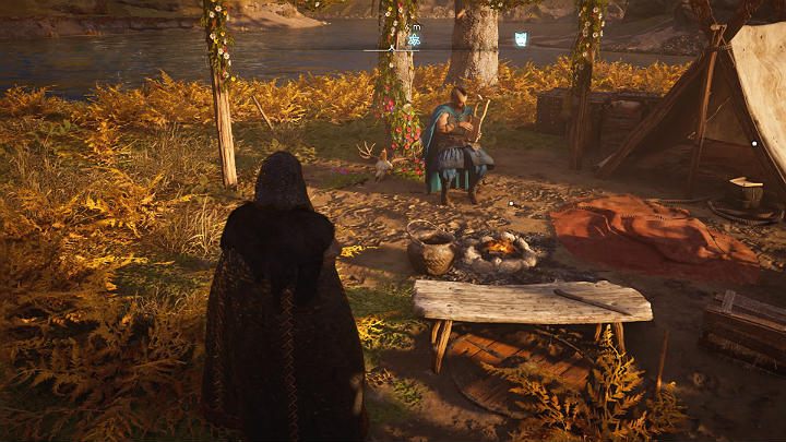 Gdy będziesz na miejscu połóż skrzynkę w pobliżu Skariego i ponownie usiądź na ławce przy ognisku, by zakończyć to zadanie - Assassins Creed Valhalla: Los starego łupieżcy/The Old Guard - solucja - Assassins Creed Valhalla - poradnik do gry