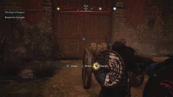 Po rozpoczęciu tego etapu zadania od razu podejdź do tarana i pomóż pozostałym wojownikom wyważyć pierwszą bramę fortecy - Assassins Creed Valhalla: Synowie Ragnara/The Sons of Ragnar - solucja - Assassins Creed Valhalla - poradnik do gry
