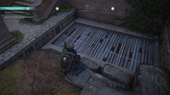 Rozbij drewnianą klapę, która zasłania wejście do podziemi i zejdź na sam dół, by się nieco rozejrzeć - Assassins Creed Valhalla: Droga do Hamartii/Road to Hamartia - solucja - Assassins Creed Valhalla - poradnik do gry