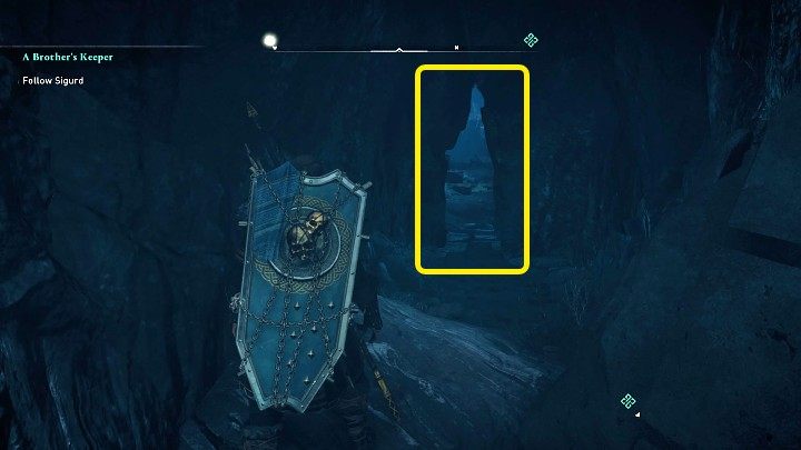Zanim wejdziesz do środka, warto odwrócić się i przez wąską szczelinę po prawej stronie przejść do bocznej groty - Assassins Creed Valhalla: Stróż brata swego / A Brothers Keeper - solucja - Assassins Creed Valhalla - poradnik do gry