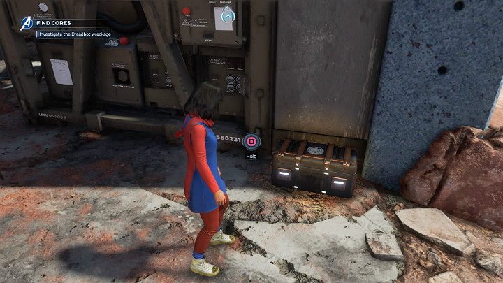Zaraz obok przepaści obok szczątków robota znajdziesz skrzynię, którą łatwo przegapić na tle ściany w podobnym kolorze - Marvels Avengers: Psy wojny/The Dogs of War - solucja, opis przejścia - Marvels Avengers - poradnik do gry