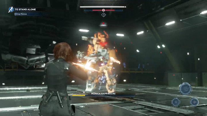 W momencie, gdy mech zasłoni swoją klatkę piersiową ramieniem, a nad jego głową pojawi się czerwony znacznik, Monica wykona szarżę - Marvels Avengers: Samotna walka/To stand alone - solucja, opis przejścia - Marvels Avengers - poradnik do gry
