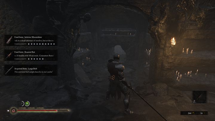 Po prawej stronie znajduje się dziura, przejdź przez nią, znajdziesz tam Petrified Winterglass oraz kolejną inskrypcję - Mortal Shell: Crypt of Martyrs solucja, opis przejścia - Mortal Shell - poradnik do gry