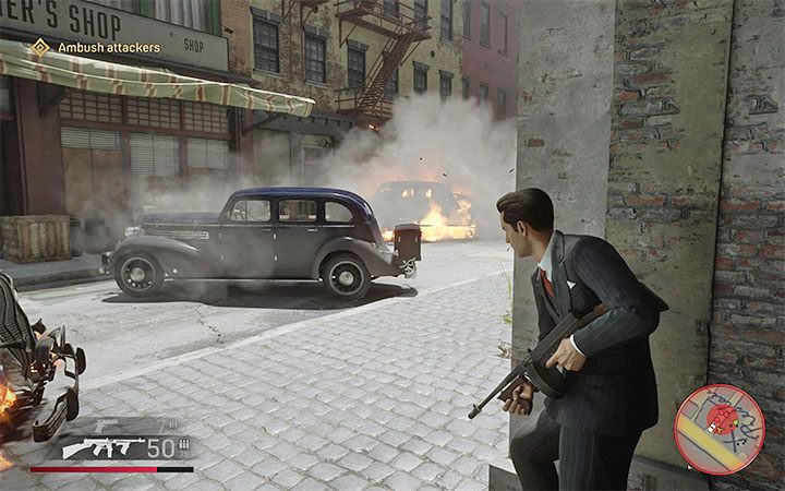 Wybranie bocznej uliczki pozwoli ci zajść od flanki pozostałych gangsterów rozstawionych przed zaatakowaną restauracją - Mafia Definitive Edition: Bon apetit! - solucja - Mafia 1 Definitive Edition - poradnik, solucja