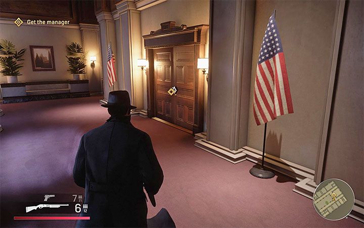 Na parterze banku gdzie rozpocząłeś misję znajdują się schody prowadzące na piętro - Mafia Definitive Edition: Praca po godzinach - solucja - Mafia 1 Definitive Edition - poradnik, solucja