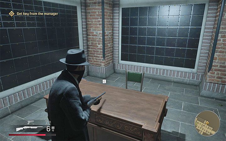 Kierownik banku ukrywa się w pomieszczeniu ze skrytkami bankowymi - Mafia Definitive Edition: Praca po godzinach - solucja - Mafia 1 Definitive Edition - poradnik, solucja