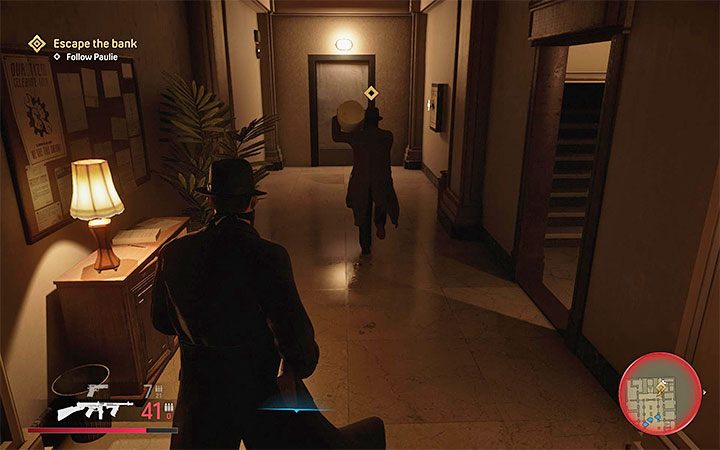 Wyrusz za Pauliem i skorzystaj ze schodów prowadzące na główne piętro banku - Mafia Definitive Edition: Praca po godzinach - solucja - Mafia 1 Definitive Edition - poradnik, solucja