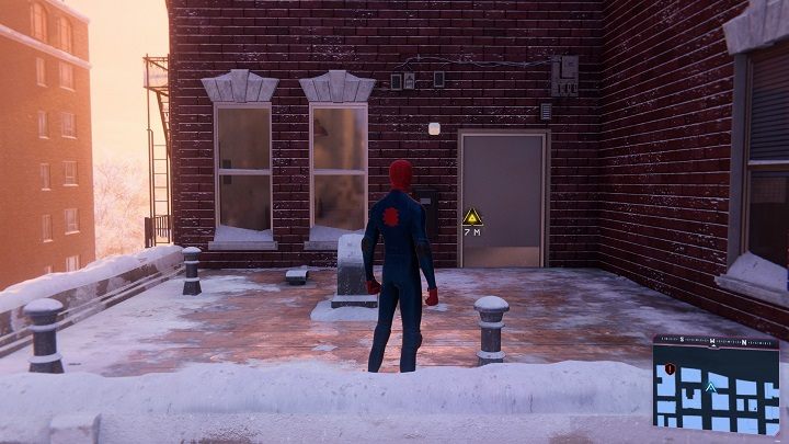 Udaj się we wskazane miejsce i wejdź przez drzwi na dach budynku - Spider-Man Miles Morales: Odnawianie znajomości - solucja, opis przejścia - Spider-Man Miles Morales - poradnik, solucja