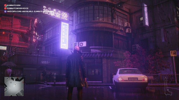 Po rozpoczęciu rozgrywki idź przed siebie, a następnie przejdź schodami na poziom ulicy i wejdź do budynku widocznego na powyższym obrazku - Hitman 3: Imogen Royce - jak zabić? Chongqing, Chiny, solucja - Hitman 3 - poradnik, solucja