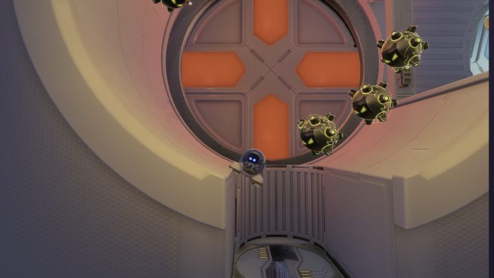 W okrągłym pokoju poleć w dół i kieruj się lodowym tunelem, aż dolecisz do pomieszczenia z dynamitem - Astros Playroom: Orbital przeszkody - solucja, opis przejścia - Astros Playroom - poradnik do gry