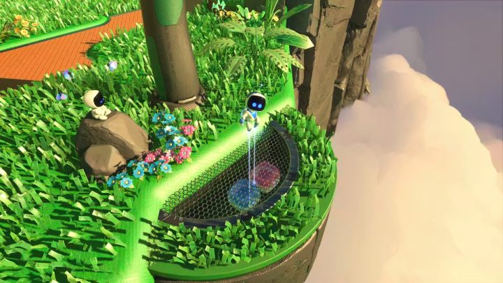 Gdy zeskoczysz z ostatniego drzewa, przy krańcu wyspy znajdziesz 3 pojemniki - Astros Playroom: Las renderów - solucja, opis przejścia - Astros Playroom - poradnik do gry