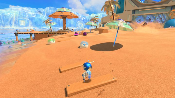 Wróć do punktu kontrolnego i zbierz monety z niebieskiego i zielonego pojemnika - Astros Playroom: Plaża botów - solucja, opis przejścia - Astros Playroom - poradnik do gry